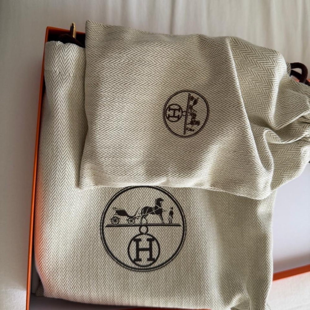 Hermès
Bleu Pale Clemence Mini Evelyne II TPM 16 Gold Hardware - Picture 4 of 7